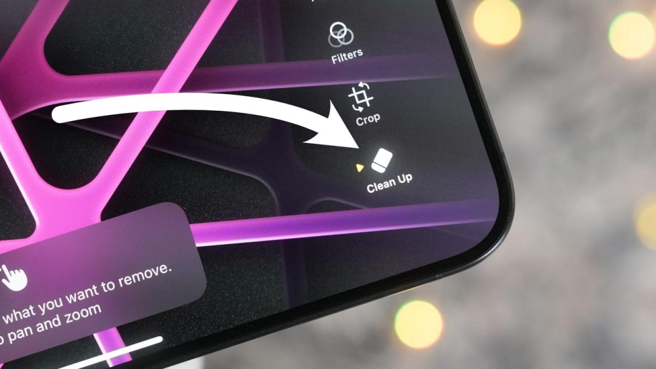 图片 1：iOS 18.1 Beta 3 中照片应用编辑模式下的“清理”按钮特写