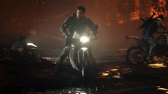 Neil 坐在摩托车上